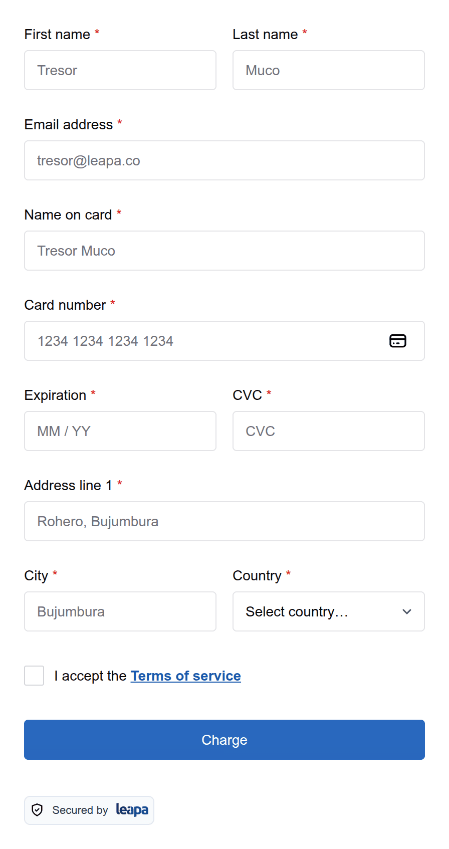The Leapa card form: name and email fields, a card number field, expiry and security code, a billing address, a terms checkbox and a Charge button, with a Secured by Leapa badge underneath